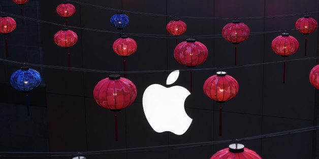 Devant un Apple Store à Pékin, le 23 février 2016. Ce 21 mars, Apple devrait dévoiler un nouvel iPhone SE.