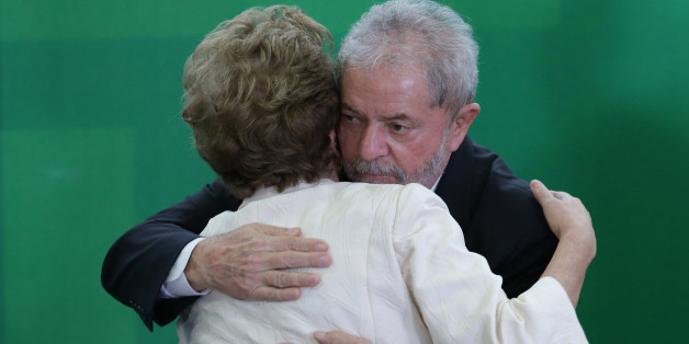 Brazilâs President Dilma Rousseff and former President Luiz Inacio Lula da Silva embrace during his swearing-in ceremony as the chief of staff, at the Planalto presidential palace, in Brasilia, Brazil, Thursday, March 17, 2016. Silva was sworn in as his successorâs chief of staff on Thursday and Rousseff insisted he would help put the troubled country back on track and denounced attempts to oust her. (AP Photo/Eraldo Peres)