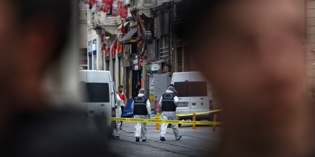 ISTANBUL, TURKEY - MARCH 19: Police secure the area as forensics inspects the blast site following a suicide bombing in a major shopping and tourist district in the central part of the city on March 19, 2016 in Istanbul, Turkey. The explosion on Istanbul's main pedestrian shopping Istiklal street today killed at least four people and left many injured. (Photo by Burak Kara/Getty Images)