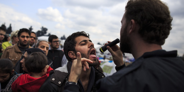 IDOMENI, GREECE - MARCH 17: A doctor from Switzerland examines in a mobile clinic a man in the Idomeni refugee camp on the Greek Macedonia border on March 17, 2016 in Idomeni, Greece. Many of the thousands of migrants stranded at the border camp are saying they are awaiting the outcome of the EU summit currently being held in Brussels. The decision by Macedonia to close its border to migrants last week has left thousands of people stranded at the Greek transit camp. The closure, following the lead taken by neighbouring countries, has effectively sealed the so-called western Balkan route, the main migration route that has been used by hundreds of thousands of migrants to reach countries in western Europe such as Germany. Humanitarian workers have described the conditions at the camp as desperate, which has been made much worse by recent spells of heavy rain. (Photo by Carsten Koall/Getty Images)
