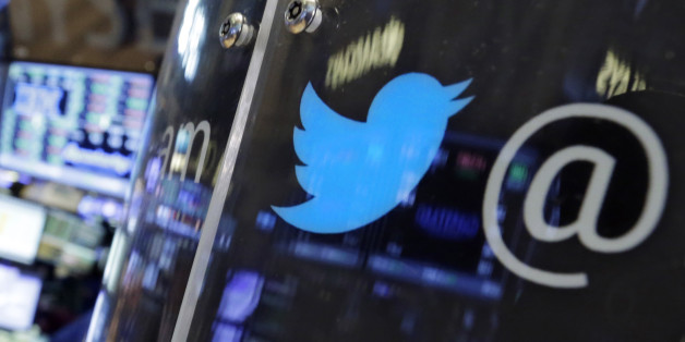 FILE - In this July 28, 2015 file photo, the logo for Twitter adorns a phone post on the floor of the New York Stock Exchange. Twitterâs battered shares dipped below their IPO price on Thursday, Aug. 20, 2015, amid ongoing investor concerns about the companyâs ability to grow its user base. (AP Photo/Richard Drew)