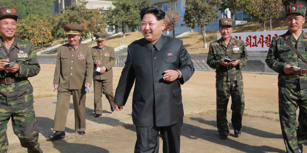 PYONGYANG, Oct. 16, 2015-- Photo provided by Korean Central News Agency on Oct. 16, 2015 shows top leader of the Democratic People's Republic of Korea (DPRK) Kim Jong Un, center, recently inspecting Unit 350 of Korean People's Army. (Xinhua/KCNA via Getty Images)