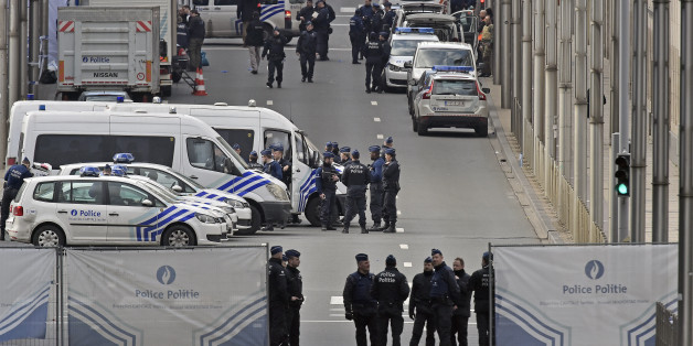 Police secure the metro station Maelbeek in Brussels, Tuesday, March 22, 2016. Explosions, at least one likely caused by a suicide bomber, rocked the Brussels airport and its subway system Tuesday, prompting a lockdown of the Belgian capital and heightened security across Europe. (AP Photo/Martin Meissner)