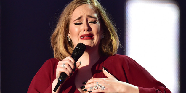 Adele collects the Global Success Award on stage during the 2016 Brit Awards at the O2 Arena, London. PRESS ASSOCIATION Photo. Picture date: Wednesday February 24, 2016. Photo credit should read: Dominic Lipinski/PA Wire