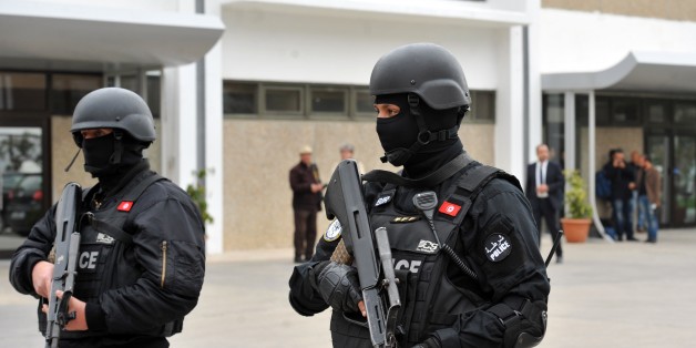 Members of Tunisian special forces stand guard outside Tunis-Carthage International airport on March 21, 2015 in Tunis, as security measures have been reinforced following the attack on Tunisia's National Bardo Museum. Was killed during the assault of the terrorist attack in Bardo Museum, two days after gunmen opened fire at visitors during an attack at the Bardo national museum. The Islamic State (IS) jihadist group claimed responsibility for the attack that killed at least 21 people. AFP PHOTO / FETHI BELAID (Photo credit should read FETHI BELAID/AFP/Getty Images)