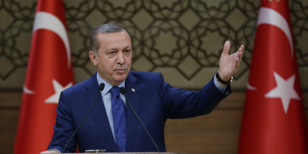 Turkish President Recep Tayyip Erdogan addresses a meeting of local administrators at his palace in Ankara, Turkey, Wednesday, March 16, 2016. Erdogan said Wednesday the United States and Russia were arming the Kurdish rebel group PKK which Turkey considers a terrorist organization. Ankara considers the PKK and the Syria-based YPG, or Kurdish Peopleâs Protection Units, to be terrorist organizations. (Murat Cetinmuhurdar, Presidential Press Service, Pool via AP )