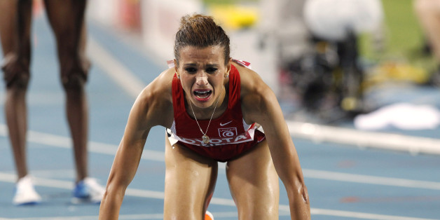 Tunisia's Habiba Ghribi reacts after placing second in the Women's 3000m Steeplechase final at the World Athletics Championships in Daegu, South Korea, Tuesday, Aug. 30, 2011. (AP Photo/Anja Niedringhaus)