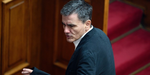 Greek Finance Minister Euclid Tsakalotos attends a committee meeting in the Greek parliament in Athens on July 22, 2015. Prime Minister Alexis Tsipras faced a new test of his authority in parliament on July 22, where MPs were to vote on a second batch of reforms to help unlock a bailout for Greece's stricken economy. The embattled premier last week faced a revolt by a fifth of the lawmakers in his radical-left Syriza party over changes to taxes, pensions and labour rules demanded by EU-IMF creditors. AFP PHOTO / LOUISA GOULIAMAKI (Photo credit should read LOUISA GOULIAMAKI/AFP/Getty Images)