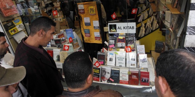 People view uncensored books newly displayed in a Tunis book store, Tuesday, Jan. 25. 2011. Tunisia's so-called "Jasmine Revolution" has sparked scattered protests and civil disobedience in the Middle East and North Africa, and much of the world is watching to see how the birth pangs of Tunisian democracy play out. (AP Photo/Christophe Ena)