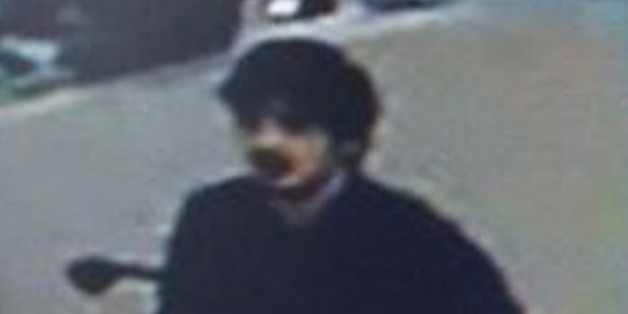 In this image provided by the Belgian Federal Police in Brussels on Tuesday, March 22, 2016 of three men who are suspected of taking part in the attacks at Belgium's Zaventem Airport. The man at right is still being sought by the police and two others in the photo that the police issued were according to a the Belgian Prosecutors 'probably' suicide bombers. Bombs exploded at the Brussels airport and one of the city's metro stations Tuesday, killing and wounding scores of people, as a European ca