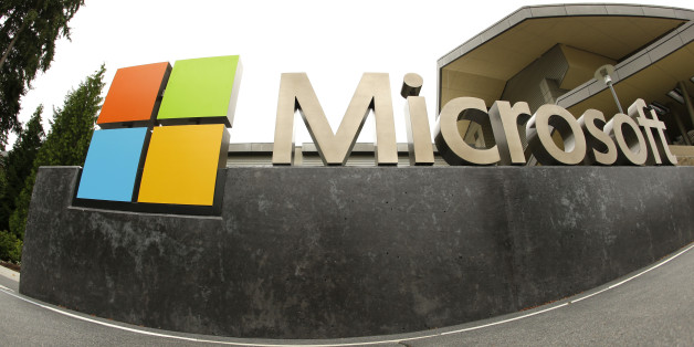 FILE - This July 3, 2014, file photo, shows the Microsoft Corp. logo outside the Microsoft Visitor Center in Redmond, Wash. Artificial-intelligence software designed by Microsoft to tweet like a teenage girl has been suspended after it began spouting offensive remarks, according to the company Thursday, March 24, 2016. Microsoft said it is making adjustments to the Twitter chatbot after users found a way to manipulate it to tweet racist and sexist remarks and made a reference to Hitler. (AP Phot