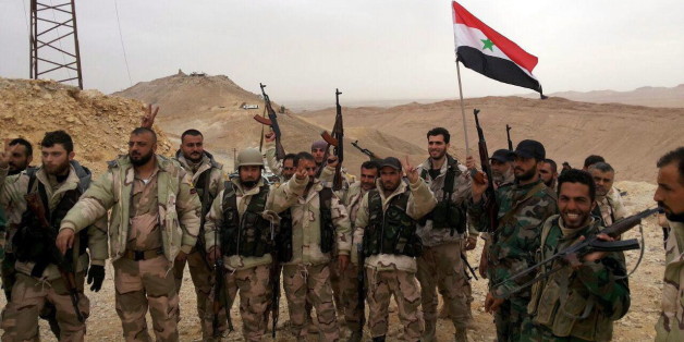 Syrische Kämpfer feiern die Rückeroberung von Palmyra