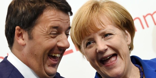 German Chancellor Angela Merkel (R) and Italian Prime Minister Matteo Renzi smile during the 10th Asia-Europe Meeting (ASEM) on October 16, 2014 in Milan. The Asia-Europe Meeting (ASEM) was created in 1996 as a forum for dialogue and cooperation between Europe and Asia held every two years alternatively in Asia and Europe. AFP PHOTO / DANIEL DAL ZENNARO (Photo credit should read DANIEL DAL ZENNARO/AFP/Getty Images)