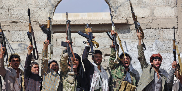 FILE - In this Dec. 15, 2015, file photo, Shiite tribesmen, known as Houthis, hold their weapons as they chant slogans during a tribal gathering showing support for the Houthi movement in Sanaa, Yemen. Saudi Arabia traded 109 Yemeni prisoners taken during its coalition war against Shiite rebels there for nine Saudis, authorities said Monday, March 27, 2016 the latest prisoner exchange ahead of a scheduled April cease-fire and peace talks. (AP Photo/Hani Mohammed, File)