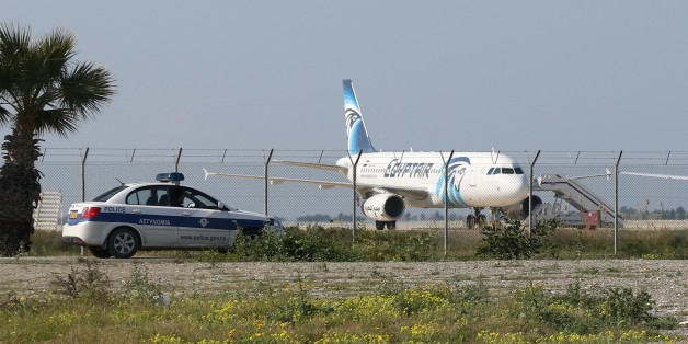 An Egypt Air Airbus A-320 sits on the tarmac of Larnaca aiport after it was hijacked and diverted to Cyprus on March 29, 2016. / AFP / STR (Photo credit should read STR/AFP/Getty Images)