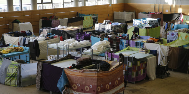 A general view shows beds inside the sports hall of the Jane-Addams high school which has been transformed into a refugee shelter in Berlin's Hohenschoenhausen district, Germany, February 2, 2016 REUTERS/Fabrizio Bensch