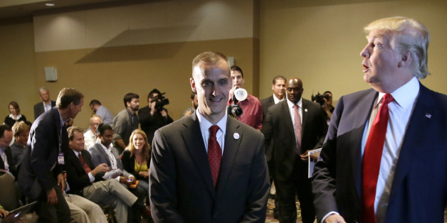 FILE - In this Aug. 25, 2015 file photo, Republican presidential candidate Donald Trump, right, walks with his campaign manager Corey Lewandowski after speaking at a news conference in Dubuque, Iowa. Breitbart News reporter Michelle Fields, who said that she was grabbed by Lewandowski as she attempted to question Trump in Florida on Tuesday, March 8, has resigned from the conservative website, saying that she can't work for an organization that doesn't support her. (AP Photo/Charlie Neibergal