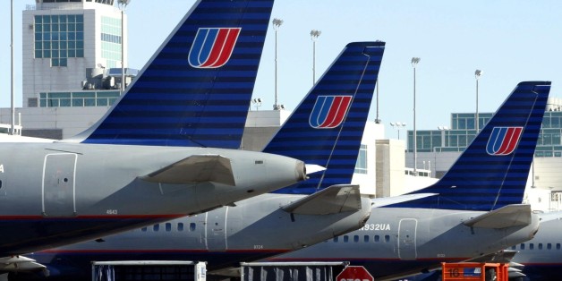United Airlines aircraft are lined up at their gates at Denver International Airport, December 9, 2002. United Airlines filed for bankruptcy on Monday, the largest ever in the global airline industry, after high costs and low airfares left the world's No. 2 carrier with too much debt and not enough cash. UAL Corp.'s United, with one of the broadest networks in the world, will continue to fly worldwide as it attempts to reorganize under protection from the U.S. Bankruptcy Court in the Northern Di