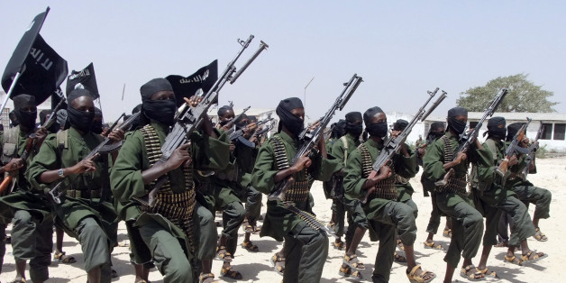 Hundreds of newly trained Shabaab fighters perform military exercises in the Lafofe area some 18Km south of Mogadishu on Thursday Feb. 17, 2011. In information which could not be independently verified, Islamist officials who spoke during the show of the force, said that five hundred fresh fighters have participated in the training session which was concluded recently and will be part of the war against Somalia government and the African peacekeepers supporting them.(AP Photo/Farah Abdi Warsameh)
