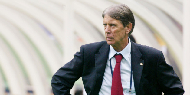 Paraguay's coach Cesare Maldini watches as his team plays to a 2-2 drawagainst South Africa in their World Cup Finals match in Pusan June 2,2002. Slovenia, Paraguay, South Africa and Spain are competing in GroupB in the World Cup Finals. REUTERS/Desmond BoylanRCS/JD