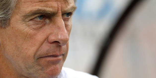 FC Lorient's coach Christian Gourcuff looks on before their French Ligue 1 soccer match against Olympique Marseille at the Moustoir stadium in Lorient September 28, 2013. REUTERS/Stephane Mahe (FRANCE - Tags: SPORT SOCCER)