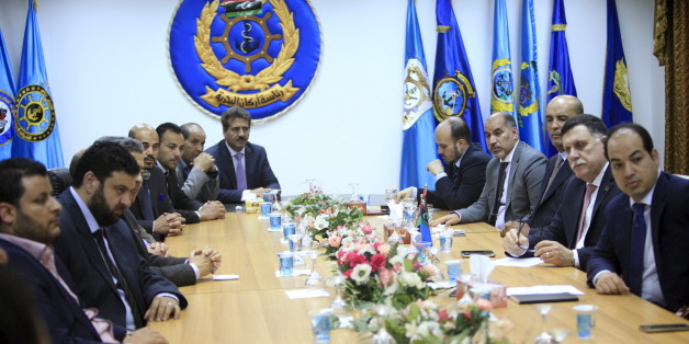 Fayez Seraj, Libyan prime minister-designate under the proposed unity government, attends a meeting with officials of municipal council of Tripoli in Tripoli, Libya, March 31, 2016. REUTERS/Ismail Zitouny