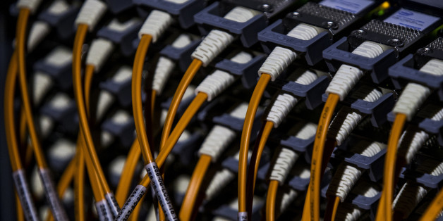 A picture shows wires at the back of a super computer at the Konrad-Zuse Centre for applied mathematics and computer science, in Berlin August 13, 2013. REUTERS/Thomas Peter (GERMANY - Tags: SCIENCE TECHNOLOGY)