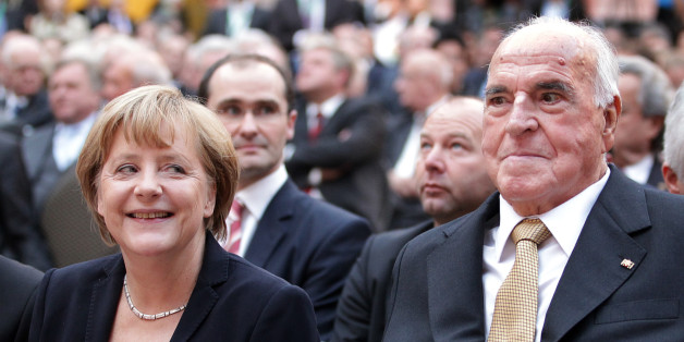 Former German Chancellor Helmut Kohl (R) and German Chancellor Angela Merkel sit in the first row at the German Historical Museum (Deutsches Historisches Museum) in Berlin on September 27, 2012. Kohl, who is celebrating the 30th anniversary of being elected Chancellor, was invited by the Konrad-Adenauer-Stiftung in honor of his political achievements. Kohl was elected German Chancellor for the first time on October 1, 1982 and led the country for 16 years. AFP PHOTO / POOL / WOLFGANG KUMM (Photo credit should read WOLFGANG KUMM/AFP/GettyImages)