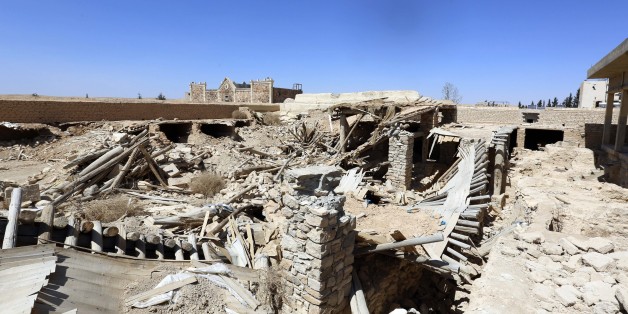 A general view shows damages at Mar Elian monastery in Qaryatain, near the central city of Homs, Syria on Monday, April 4, 2016. Qaryatain used to be home to a sizable Christian population and lies midway between Palmyra and the capital, Damascus. Activists said last summer that Qaryatain had a mixed population of around 40,000 Sunni Muslims and Christians, as well as thousands of internally displaced people who had fled from the nearby city of Homs. Many of the Christians fled the town after it