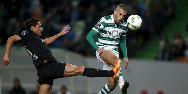 Football Soccer - Sporting v Academica - Portuguese Premier League - Alvalade, Lisbon, Portugal - 30/01/16 Sporting's Islam Slimani (R) and Academica's Fernando Alexandre in action. REUTERS/Rafael Marchante