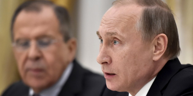 Russian President Vladimir Putin (R) and Foreign Minister Sergei Lavrov attend a meeting with U.S. Secretary of State John Kerry (not pictured) at the Kremlin in Moscow, Russia, March 24, 2016. REUTERS/Alexander Nemenov/Pool