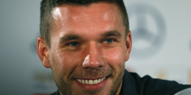 Lukas Podolski, player of Germany's national soccer team, addresses the media during a news conference in Munich, Germany, November 10, 2015. REUTERS/Michael Dalder