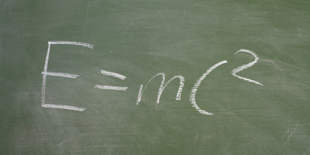 Albert Einstein's famous theory of relativity - E=mc2 - written in chalk