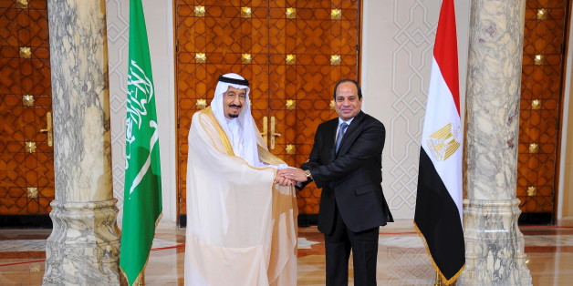 Egyptian President Abdel Fattah al-Sisi and King Salman of Saudi Arabia shake hands during the reception ceremony in the Egyptian Presidential Palace in Cairo, Egypt April 7, 2016 in this handout courtesy of the Egyptian Presidency. REUTERS/The Egyptian Presidency/Handout via Reuters ATTENTION EDITORS - THIS PICTURE WAS PROVIDED BY A THIRD PARTY. REUTERS IS UNABLE TO INDEPENDENTLY VERIFY THE AUTHENTICITY, CONTENT, LOCATION OR DATE OF THIS IMAGE. FOR EDITORIAL USE ONLY. NOT FOR SALE FOR MARKETI