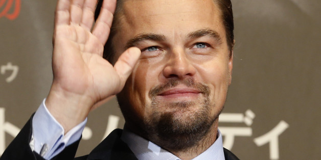 American actor Leonardo DiCaprio waves for fans during the Japan premiere of his new movie "The Revenant" in Tokyo, Japan, Wednesday, March 23, 2016. (AP Photo/Shizuo Kambayashi)