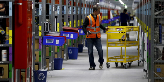 Worker sorts products at an Amazon Fulfilment Center in Wroclaw, Poland December 3, 2015, during the busy holiday shopping season. Picture taken December 3, 2015. REUTERS/Kacper Pempel