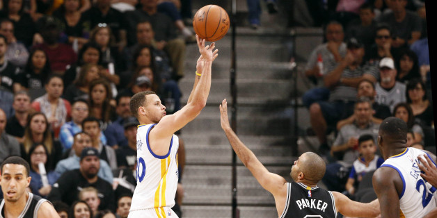 Apr 10, 2016; San Antonio, TX, USA; Golden State Warriors point guard Stephen Curry (30) shoots the ball over San Antonio Spurs point guard Tony Parker (9) during the first half at AT&T Center. Mandatory Credit: Soobum Im-USA TODAY Sports