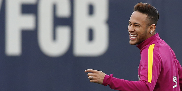 FC Barcelona's Neymar smiles during a training session at the Sports Center FC Barcelona Joan Gamper in San Joan Despi, Spain, Friday, April 1, 2016. FC Barcelona will play against Real Madrid Saturday in a Spanish La Liga soccer match, dubbed 'el clasico'. (AP Photo/Manu Fernandez)