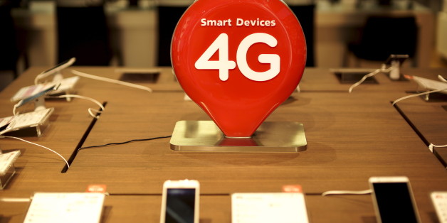 A 4G sign is pictured at a department store in Bangkok, Thailand, November 16, 2015. REUTERS/Athit Perawongmetha