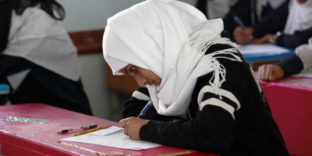 A Yemeni female student sits for the mid-year school exams at a secondary school on February 9, 2016 in the capital Sanaa. / AFP / MOHAMMED HUWAIS (Photo credit should read MOHAMMED HUWAIS/AFP/Getty Images)