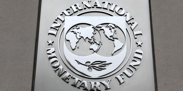 The International Monetary Fund (IMF) logo is seen at the IMF headquarters building during the 2013 Spring Meeting of the International Monetary Fund and World Bank in Washington, April 18, 2013. REUTERS/Yuri Gripas (UNITED STATES - Tags: POLITICS BUSINESS)