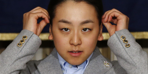Japan's Olympic figure skater Mao Asada attends a news conference at the Foreign Correspondents' Club of Japan in Tokyo February 25, 2014. Japanese figure skater Mao Asada, who rebounded from a disastrous short programme at the Sochi Olympics to gain the best score of her career in the free skate, is now wavering on whether to retire from competition. REUTERS/Toru Hanai (JAPAN - Tags: SPORT FIGURE SKATING OLYMPICS)
