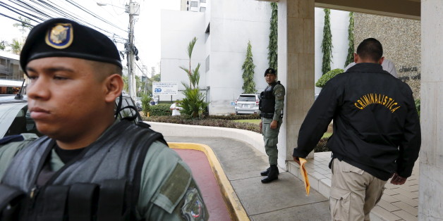 A man with a jacket that reads "Criminology" enters the Mossack Fonseca law firm office in Panama City April 12, 2016. REUTERS/Carlos Jasso