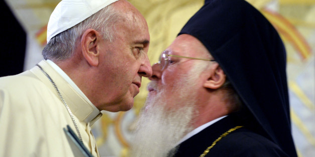 Pope Francis, left, and Ecumenical Patriarch Bartholomew I greet each other after issuing a joint declaration, in Istanbul, Sunday, Nov. 30, 2014. Pope Francis and the spiritual leader of the world's Orthodox Christians, Ecumenical Patriarch Bartholomew I, issued a joint declaration Sunday at the end of Francis' visit to Turkey during which the pope prayed in one of Istanbul's most important mosques. They wrote: "Inspired by common values and strengthened by genuine fraternal sentiments, Muslims and Christians are called to work together for the sake of justice, peace and respect for the dignity and rights of every person." (AP Photo/Filippo Monteforte, Pool)