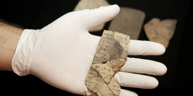 Letters inscribed on pottery, known as ostracons, which were unearthed in an excavation of a fort in Arad, Israel, and dated to about 600 B.C. shortly before Nebuchadnezzarâs destruction of Jerusalem, are seen in Israel Museum in Jerusalem Tuesday, April 12, 2016. A Tel Aviv University team determined that this famous hoard of ancient Hebrew inscriptions was written by at least six different authors. Although the inscriptions are not from the Bible, their discovery suggests there was widespread literacy in ancient Judah at the time that would support the composition of biblical works. (AP Photo/Dan Balilty)