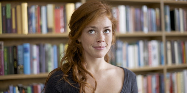 Indecisive young Woman in a Bookstore
