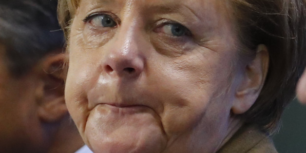 German Chancellor Angela Merkel frowns during a news conference at the Chancellery in Berlin, Germany, April 14, 2016. REUTERS/Fabrizio Bensch