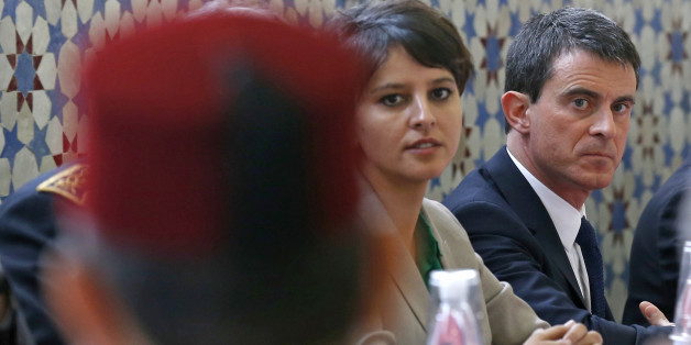 France's Prime Minister Manuel Valls (R) and Education and Research minister Najat Vallaud-Belkacem (L) attend a meeting with regional representatives of the Muslim community at Strasbourg Grand Mosque in Strasbourg, March 3, 2015.