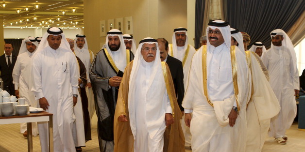 Qatar's Oil Minister Mohammed Saleh al-Sada (R) walks with Saudi Arabia's Oil Minister Ali al-Naimi as they arrive for a meeting of Gulf states' oil ministers in Doha, September 10, 2015. Gulf energy producers will continue to invest to maintain stable energy supplies, Qatar's Oil Minister Mohammed al-Sada said in Doha on Thursday ahead of a meeting of Gulf states' oil ministers. REUTERS/Naseem Zeitoon