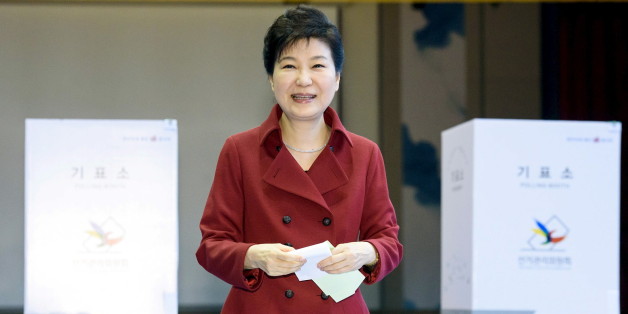 South Korean President Park Geun-hye casts her ballot at a polling station in Seoul, in this handout picture provided by the Presidential Blue House and released by News1 on April 13, 2016. REUTERS/The Presidential Blue House/News1 ATTENTION EDITORS - THIS IMAGE HAS BEEN SUPPLIED BY A THIRD PARTY. FOR EDITORIAL USE ONLY. NOT FOR SALE FOR MARKETING OR ADVERTISING CAMPAIGNS. SOUTH KOREA OUT. NO COMMERCIAL OR EDITORIAL SALES IN SOUTH KOREA. FOR EDITORIAL USE ONLY. NO RESALES. NO ARCHIVES. THIS IMA